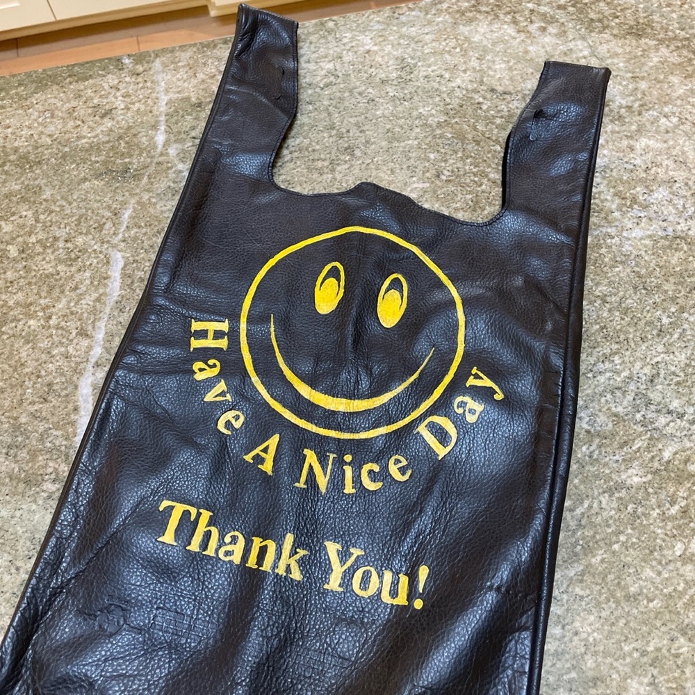 Black leather smiley face bag/purse/tote by Cast of Vices. Hand painted.